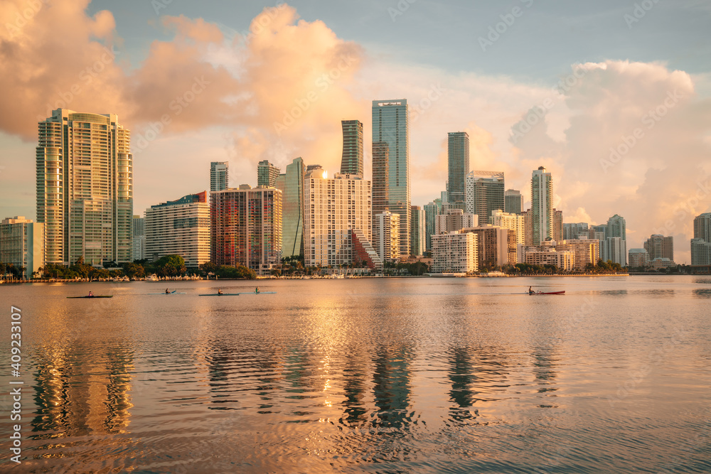 city skyline at sunset Miami Florida Sumer se reflections sun urban buildings 