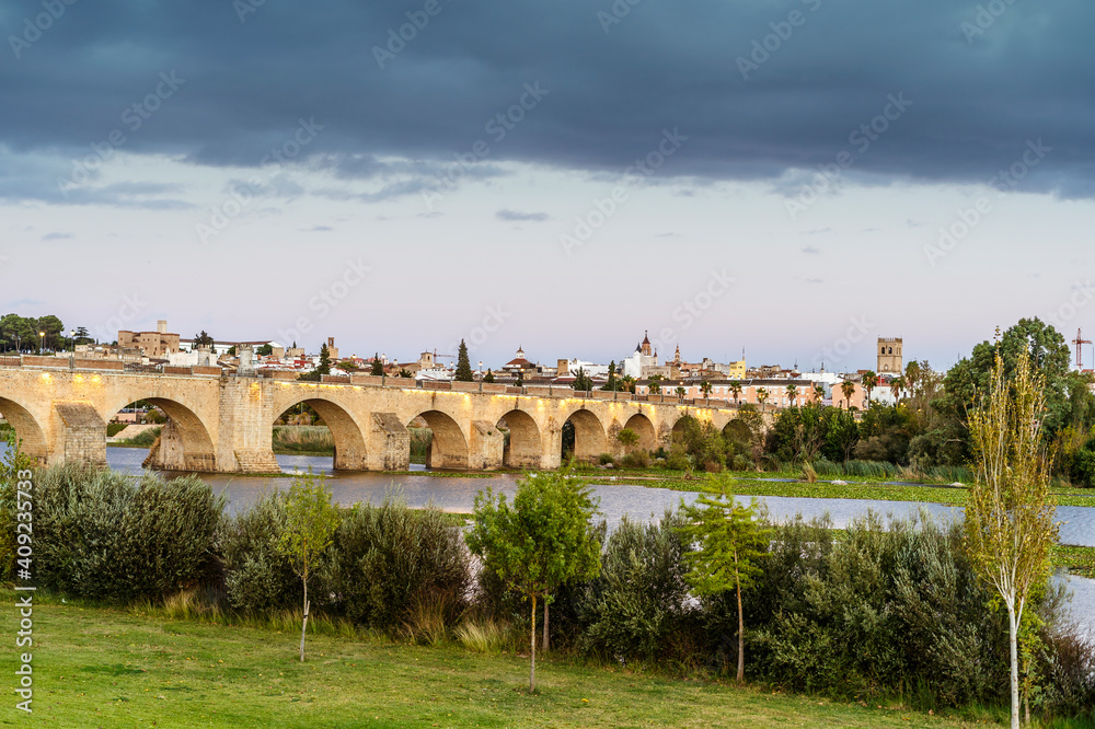Medieval Palmas Bridge over wide river in Badajoz, Spain