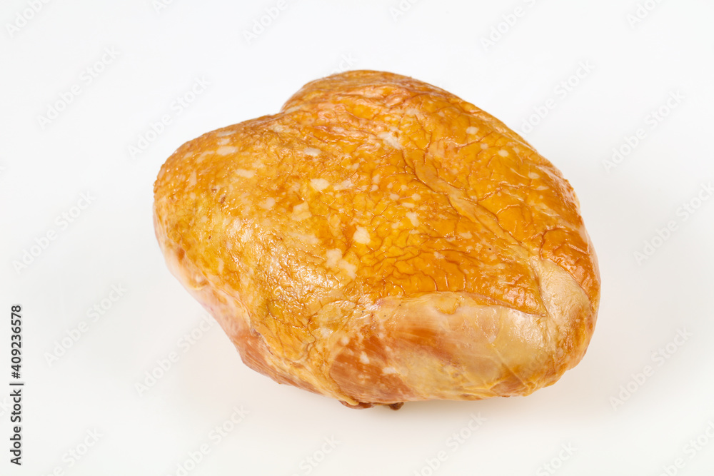 Smoked chicken breast over white background Smoked chicken breast over white background
