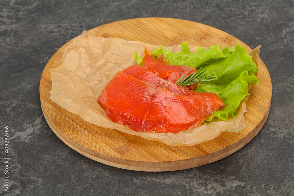 Sliced salmon fillet served rosemary Sliced salmon fillet served rosemary
