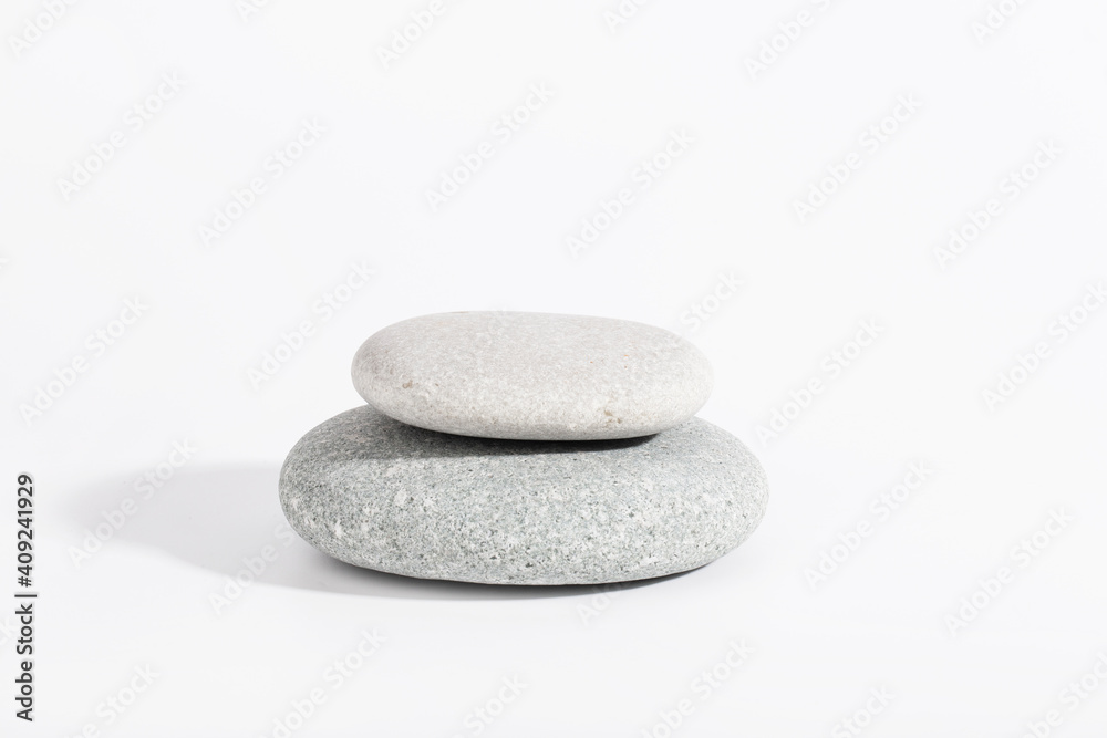 Empty grey stones podium on white color background. Empty showcase for cosmetic product presentation. Fashion magazine. Empty grey stones podium on white color background. Empty showcase for cosmetic product presentation. Fashion magazine.