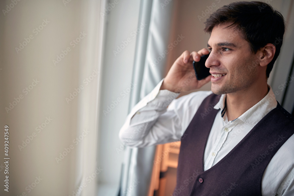 Well-dressed businessman preparing for a successfull day Well-dressed businessman preparing for a successfull day