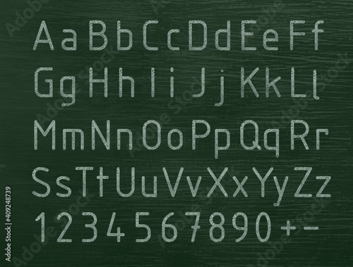 English alphabet chalk on green blackboard