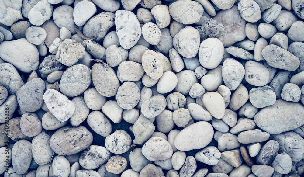 White pebbles stone or river stone texture and background White pebbles stone or river stone texture and background