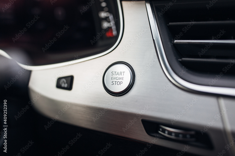 Luxury car engine start and stop button