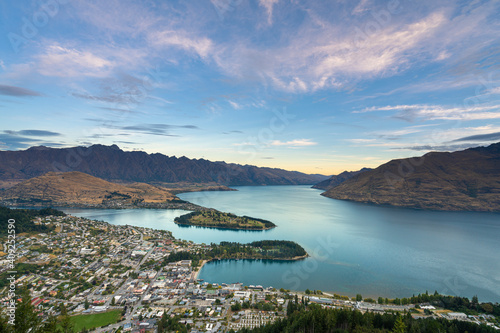 Scenic view of Queenstown and Lake Wakatipu at dusk, Otago Region, South Island, New Zealand photo