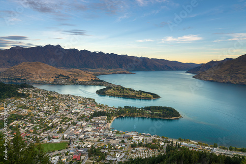 Scenic view of Queenstown and Lake Wakatipu at dusk, Otago Region, South Island, New Zealand photo