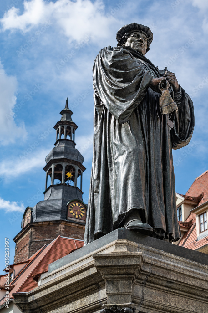 Statute of Martin Luther in Market Square of Lutherstadt Eisleben in Saxony-Anhalt, Germany. Martin Luther was born in Eisleben in 1483 and died here in 1546. Statute of Martin Luther in Market Square of Lutherstadt Eisleben in Saxony-Anhalt, Germany. Martin Luther was born in Eisleben in 1483 and died here in 1546.