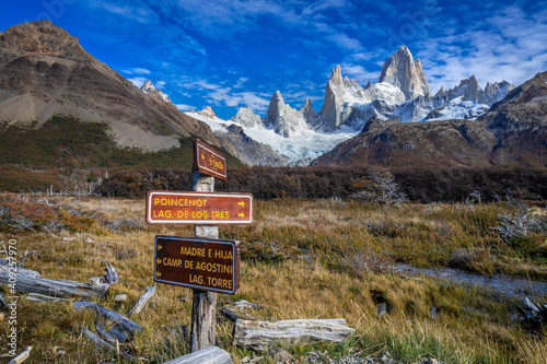 Trail direction signs against iconic Fitz Roy mountain, Sendero al Fitz Roy, UNESCO, Los Glaciares National Park, El Chalten, Santa Cruz Province, Argentina photo