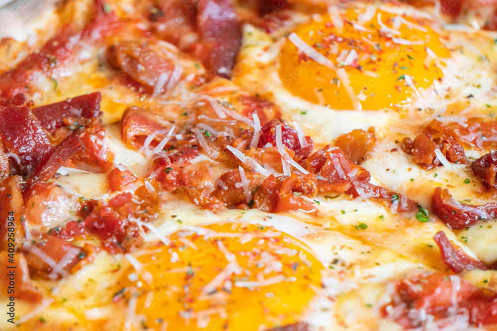 Ham and Eggs Breakfast style pizza on wooden platter Ham and Eggs Breakfast style pizza on wooden platter