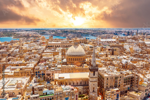 Aerial view early morning at sunrise of Lady of Mount Carmel church, St.Paul's Cathedral in Valletta city center, Malta.