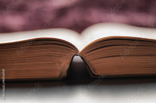 One big open book on a desk photo