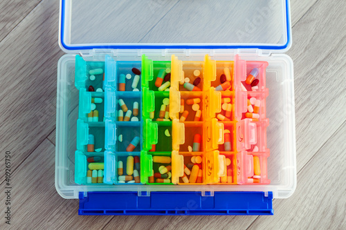 Medication, tablets - a few months after a kidney transplant, stored in a weekly pill box