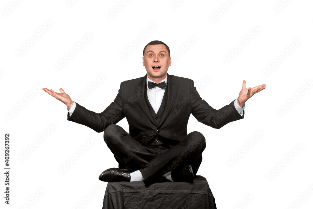 young man in a jacket and bow tie emotionally spread his arms young man in a jacket and bow tie emotionally spread his arms