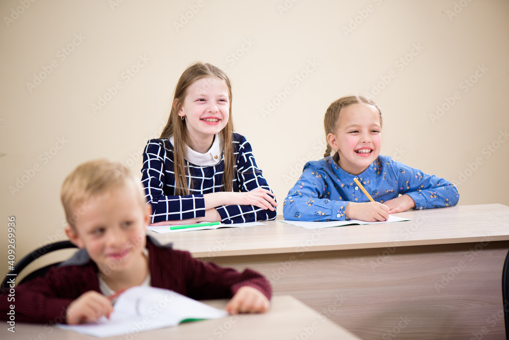 Children are students together in a classroom in school get the education. Children are students together in a classroom in school get the education.
