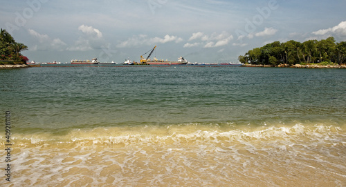  View of the Singapore Strait from the Siloso Beach of Sentosa Island photo