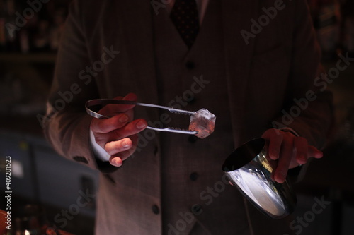 person holding a glass of wine