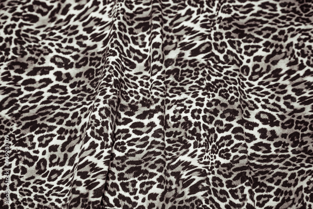 Leopard effect fabric pattern background sample. Leopard print seamless background. Leopard effect fabric pattern background sample. Leopard print seamless background.