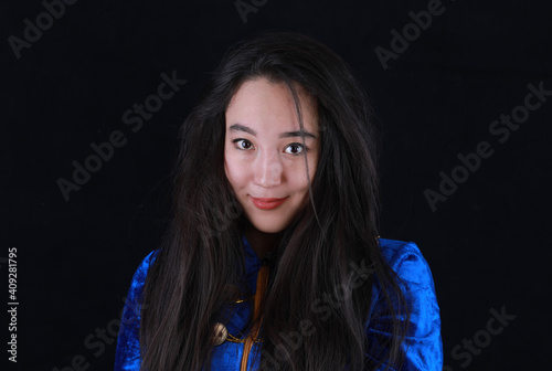 studio portrait of a young beautiful asian woman, kazakh girl