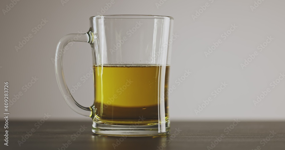 Dropping ice cube in carbonated drink 120fps slow motion footage Dropping ice cube in carbonated drink 120fps slow motion footage