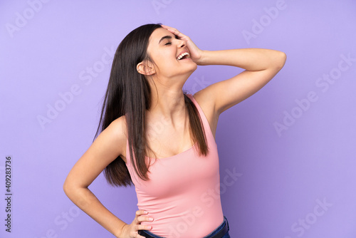 Young woman over isolated purple background has realized something and intending the solution