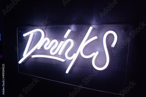 drinks. neon LED inscription on the bar. 