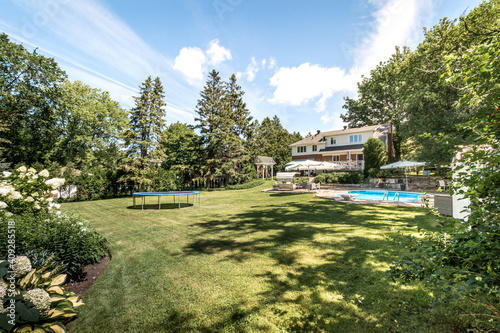 Beautiful Canadian House with backyard and swimming pool in Montreal's Suburb