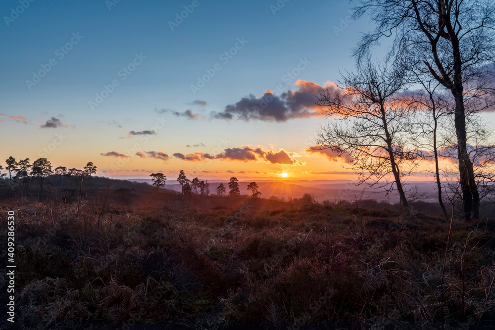 Sunset over Blackdown Sussex looking towards the South Downs. The end of a cold January winters day, looking south, south west, at the highest point in West Sussex