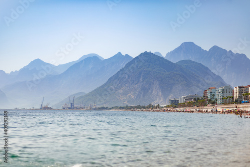 Coast strewn with holidaymakers in the off-season, Konyaalti district, Liman. Antalya, Turkey - October 25, 2020.