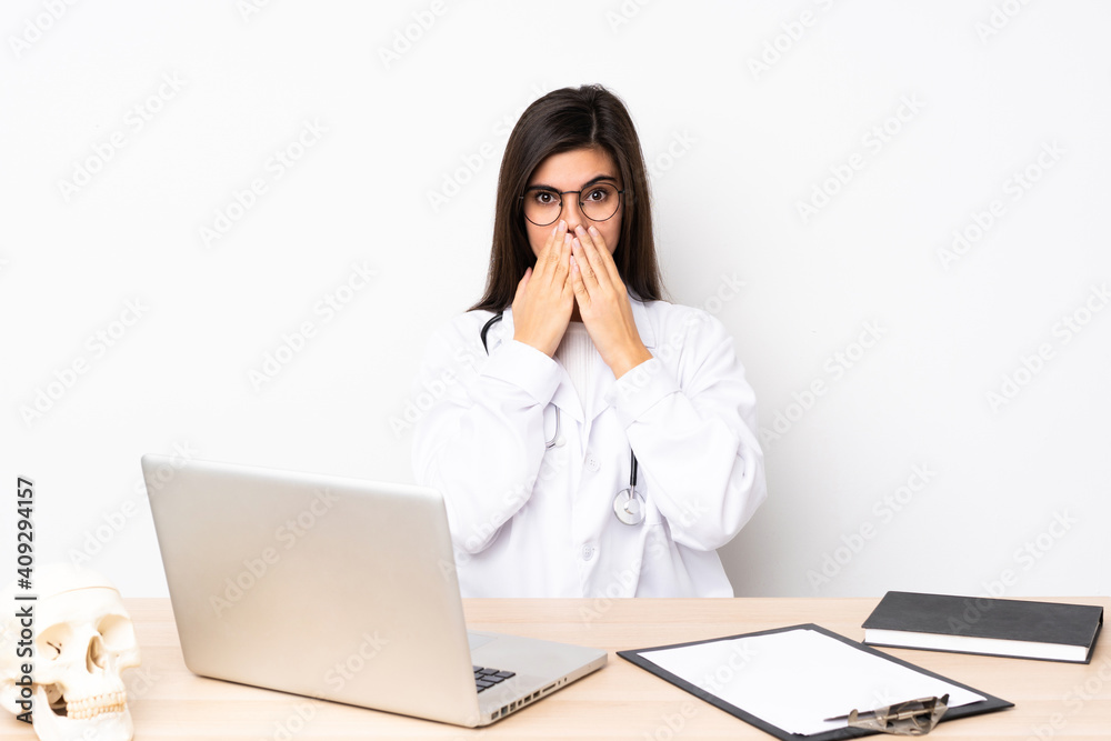 Professional traumatologist in workplace with surprise facial expression Professional traumatologist in workplace with surprise facial expression