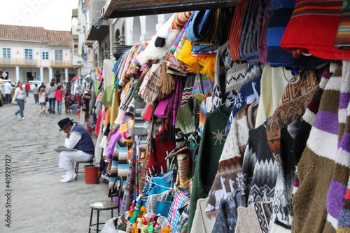 Sale of traditional Ecuadorian clothing at the Cuenca market 