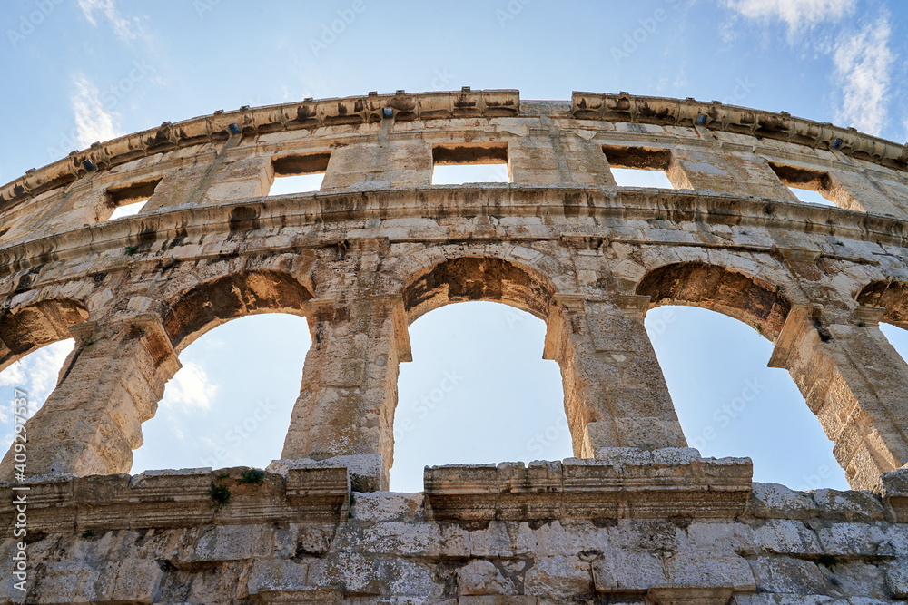 Ancient Roman amphitheater arena ruins in Pula, Croatia.