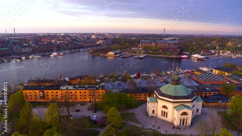Aerial over Skeppsholmskyrkan with the amazing Stockholm skyline in background, Sweden.