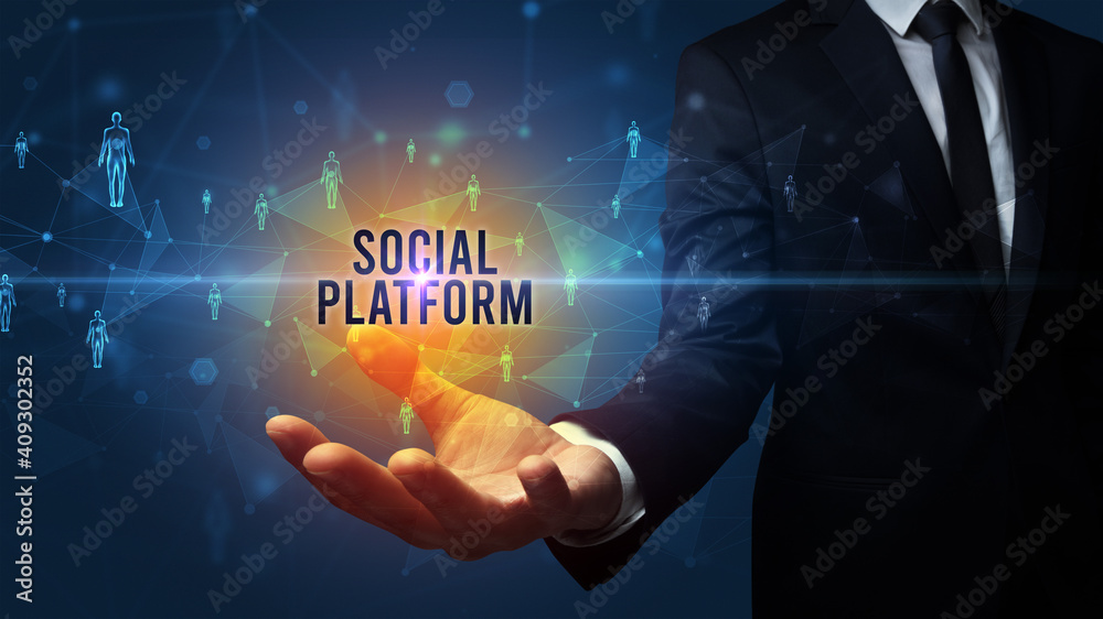 Elegant hand holding SOCIAL PLATFORM inscription, social networking concept Elegant hand holding SOCIAL PLATFORM inscription, social networking concept
