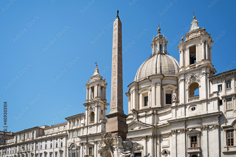Obelisk of Four Rivers Fountain in Piazza Navona and church of 

Santa Agnese in Agone, Rome, Italy, Europe. 