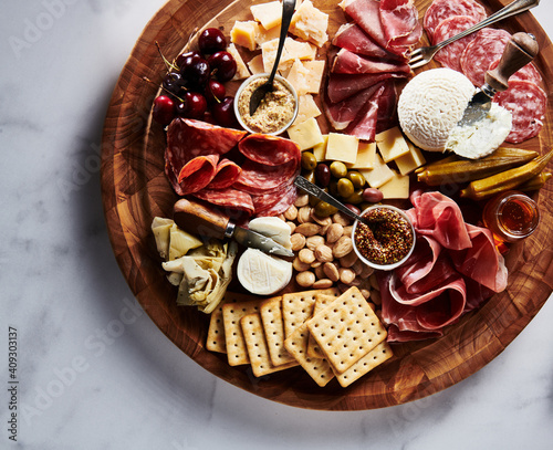 Luxurious Charcuterie Board with Cheese, Fruit, Meat, and Pickles