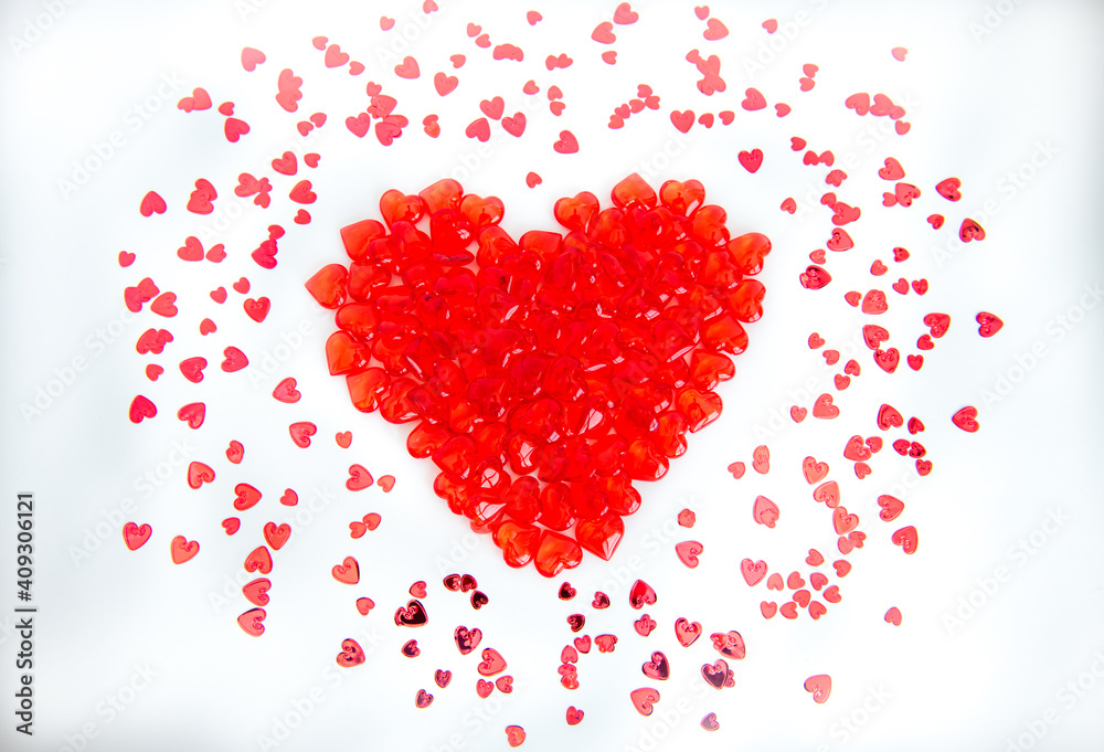 Heart made of glass hearts on a white background. Valentine's Day