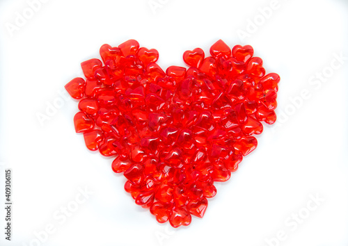 Heart made of glass hearts on a white background. Valentine's Day