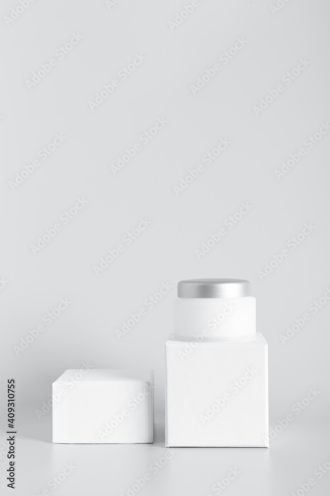 Cosmetic cream on podium over color background with copy space Cosmetic cream on podium over color background with copy space