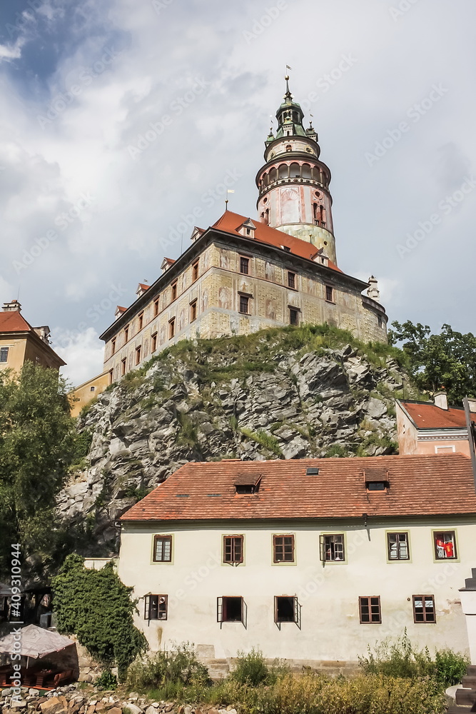 Cesky Krumlov Castle with Tower and rafting on Vltava river, Czech Republic