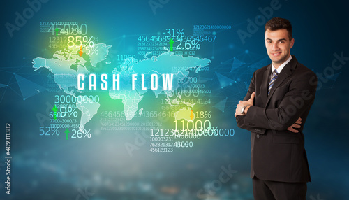 Businessman in front of a decision with CASH FLOW inscription, business concept