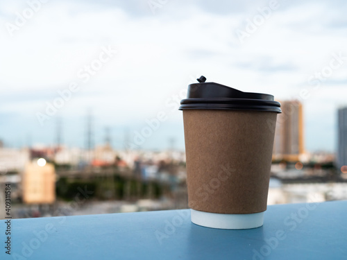 Morning coffee on the balcony or on the sky building and a nice view.