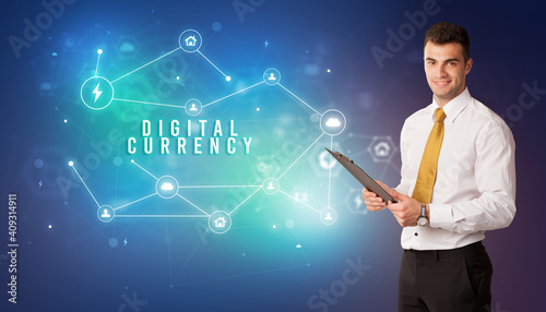 Businessman in front of cloud service icons with DIGITAL CURRENCY inscription, modern technology concept