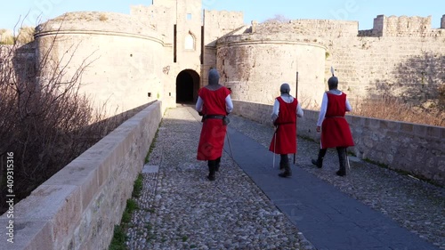 Rhodes Greece :A patrol of medieval knights guarding the main gate - entrance of the palace