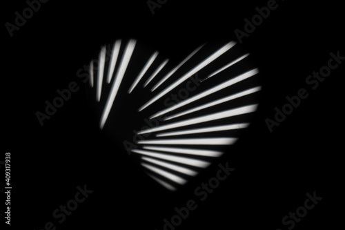 white heart on a black background with different patterns