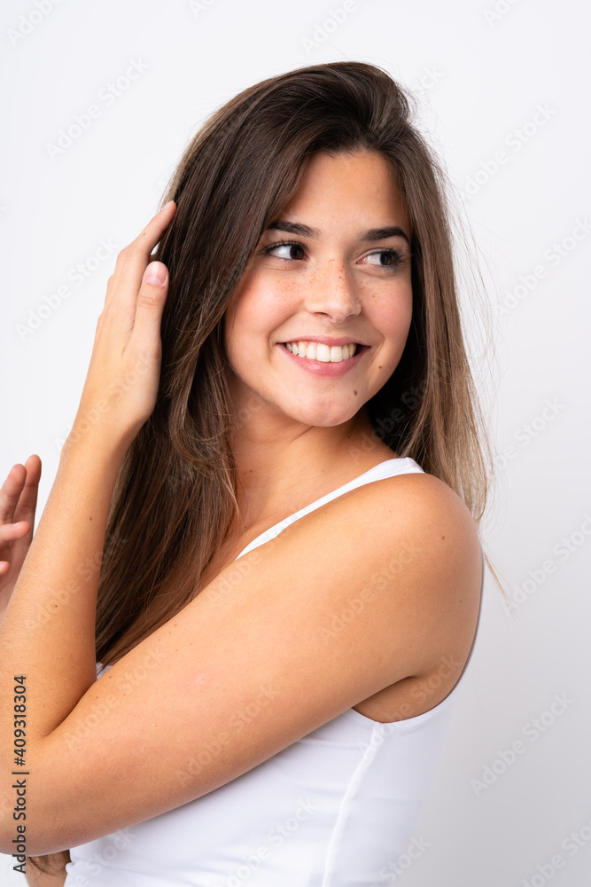 Portrait of pretty teenager Brazilian girl over isolated background Portrait of pretty teenager Brazilian girl over isolated background