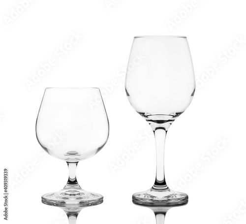 Wine glass and brandy isolated on white background