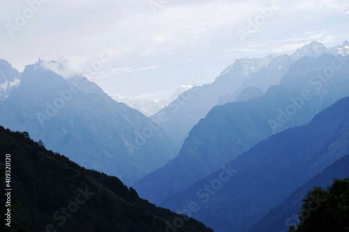 himalayan mountain range with foggy valley at munsiyari, uttarakhand, india