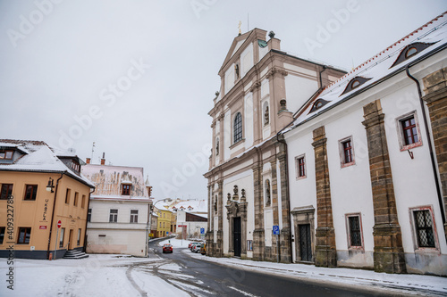 The Augustinian baroque monastery with the Basilica of All Saints  abbey in Bohemia under snow in winter day  Ceska Lipa  North Bohemia  Czech Republic