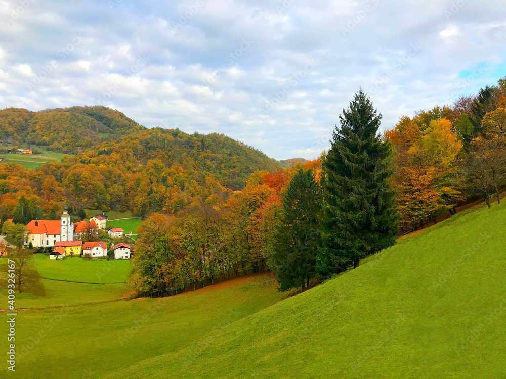 Autumn idyllic rural landscape Slovenia Europe. Scenic village Jelenov Greben. Slovenian countryside. Green hills. Spectacular nature. Wonderful peaceful land. Olimska gora mountain. Autumn idyllic rural landscape Slovenia Europe. Scenic village Jelenov Greben. Slovenian countryside. Green hills. Spectacular nature. Wonderful peaceful land. Olimska gora mountain.